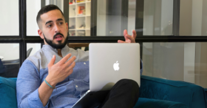 Man on couch with laptop